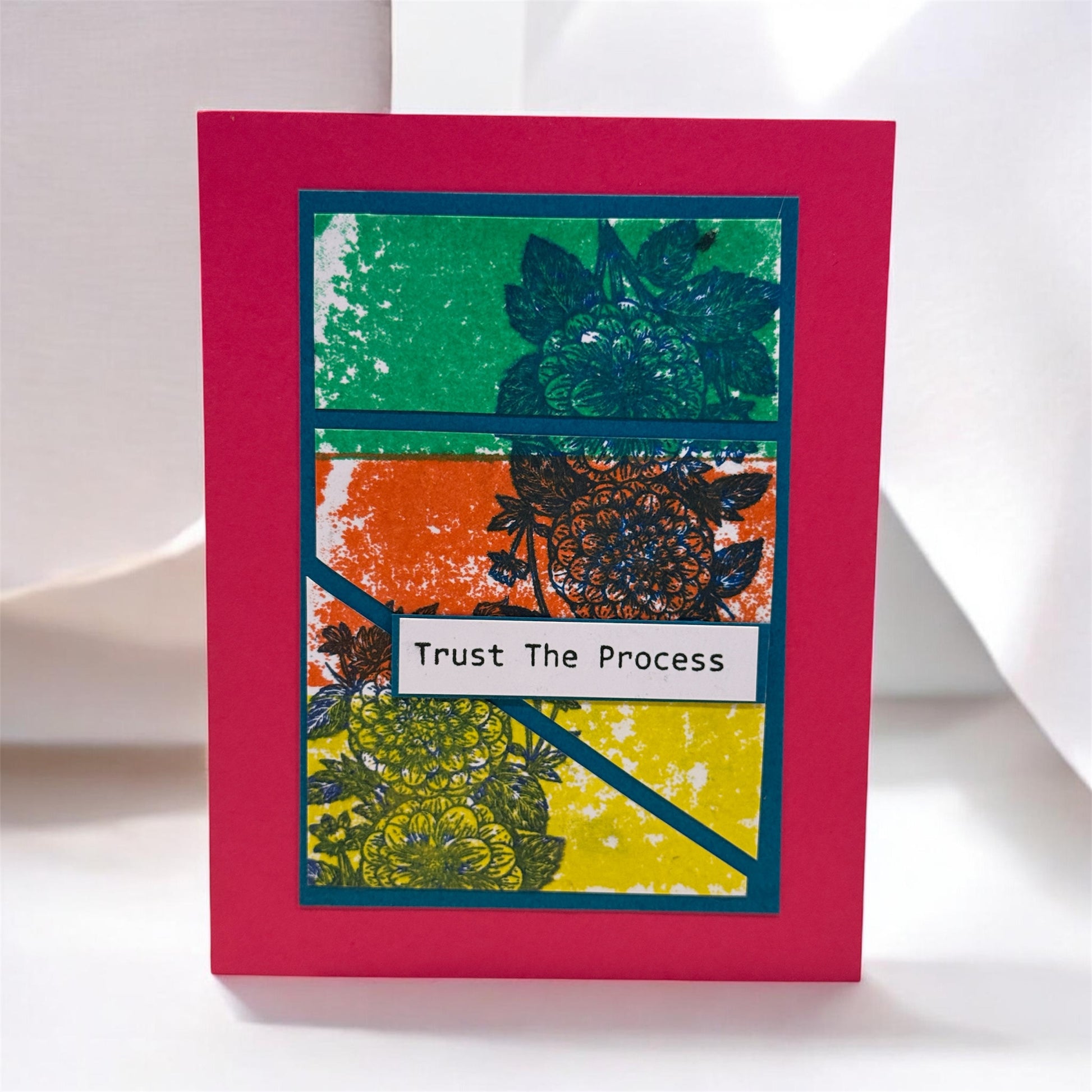 Colorful card with floral patterns and 'Trust The Process' text on a white background