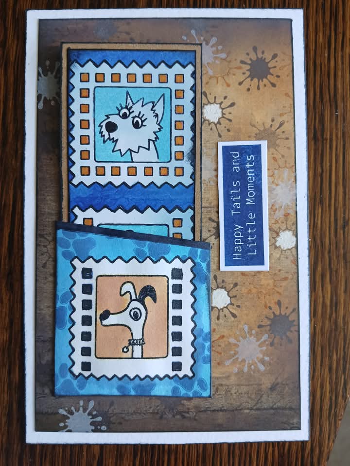 artwork showing two dogs in blue colour frames and splats