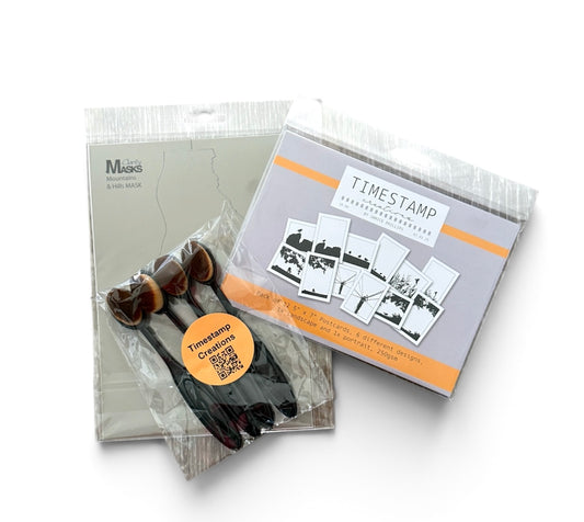 Packaging of 'Times Stamp' with a set of hair extensions on a white background