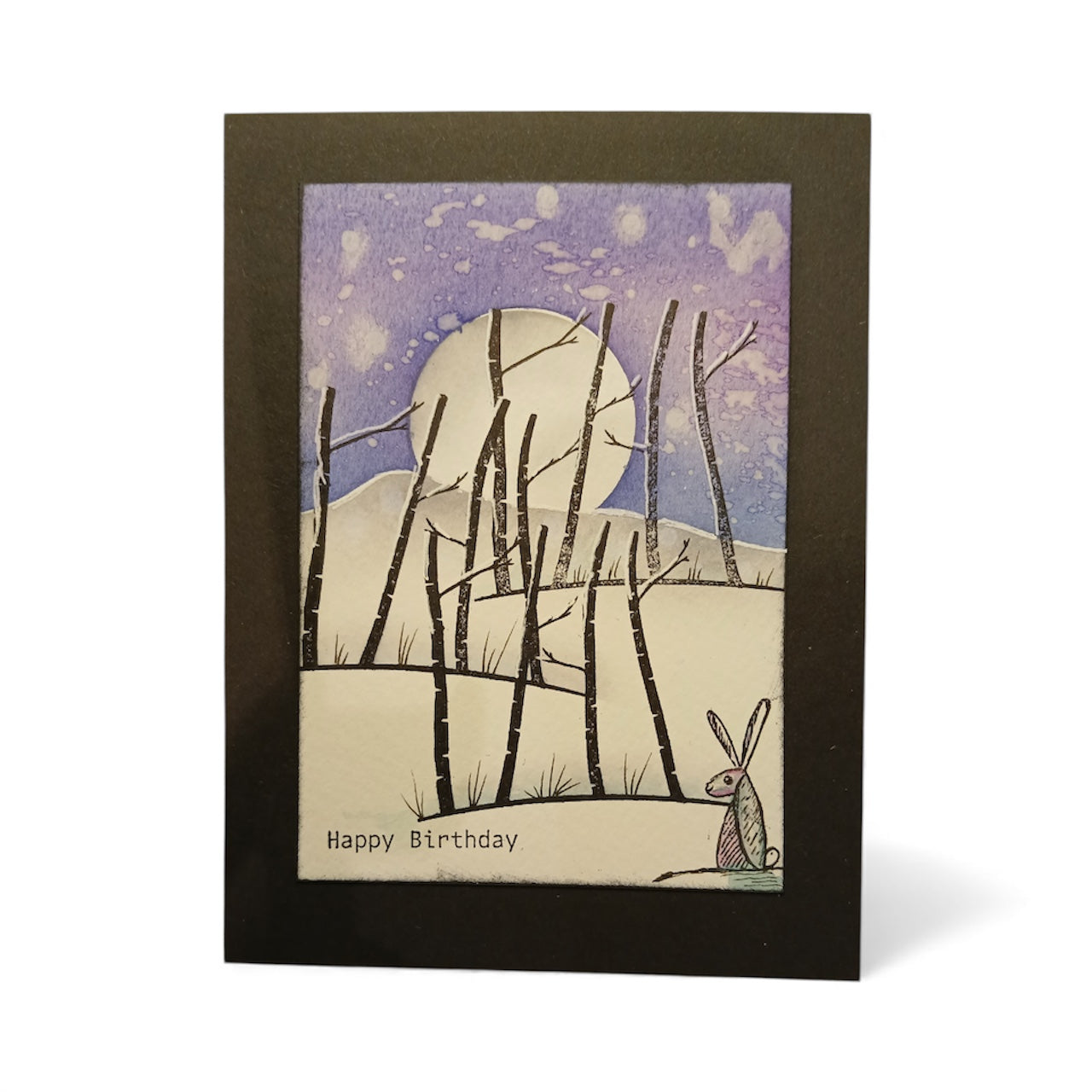 illustration showing a hare in the trees with text