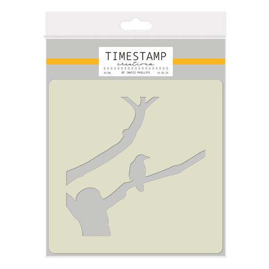 A packaged craft stencil from TimESTAMP Creative, featuring a bird perched on a tree branch silhouette. The product is in its retail packaging with a white header card and a gray and beige cardstock sample insert.