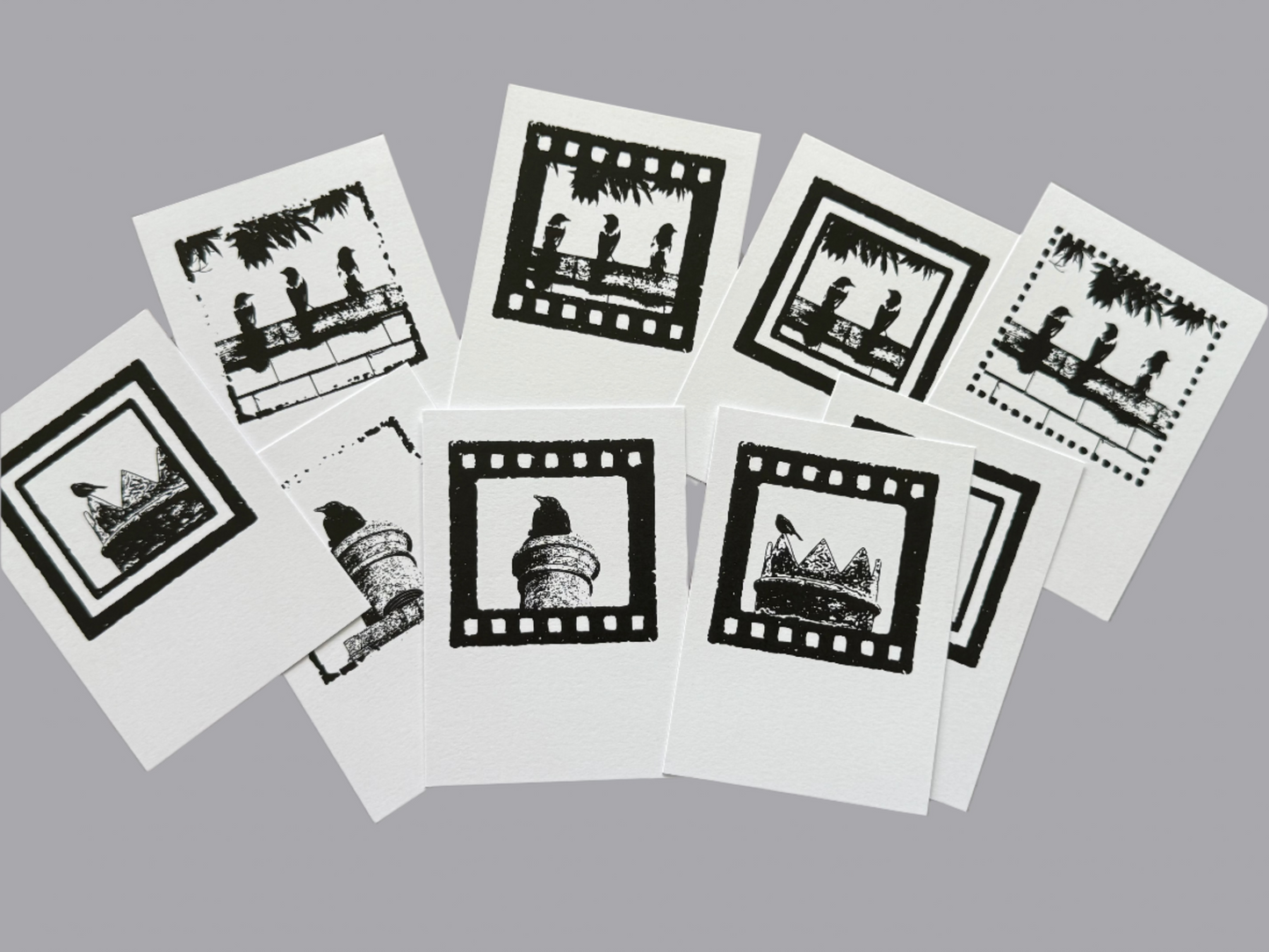 Set of A7 postcards with birds in frames 