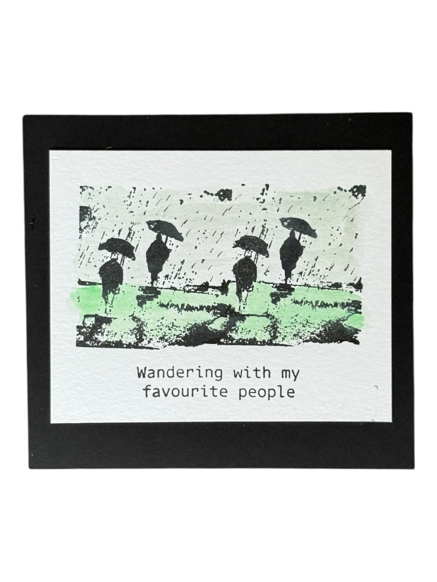 people waling in the rain